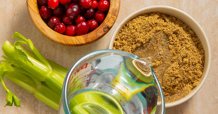 Bowls and containers of pure ingredients used in dog food